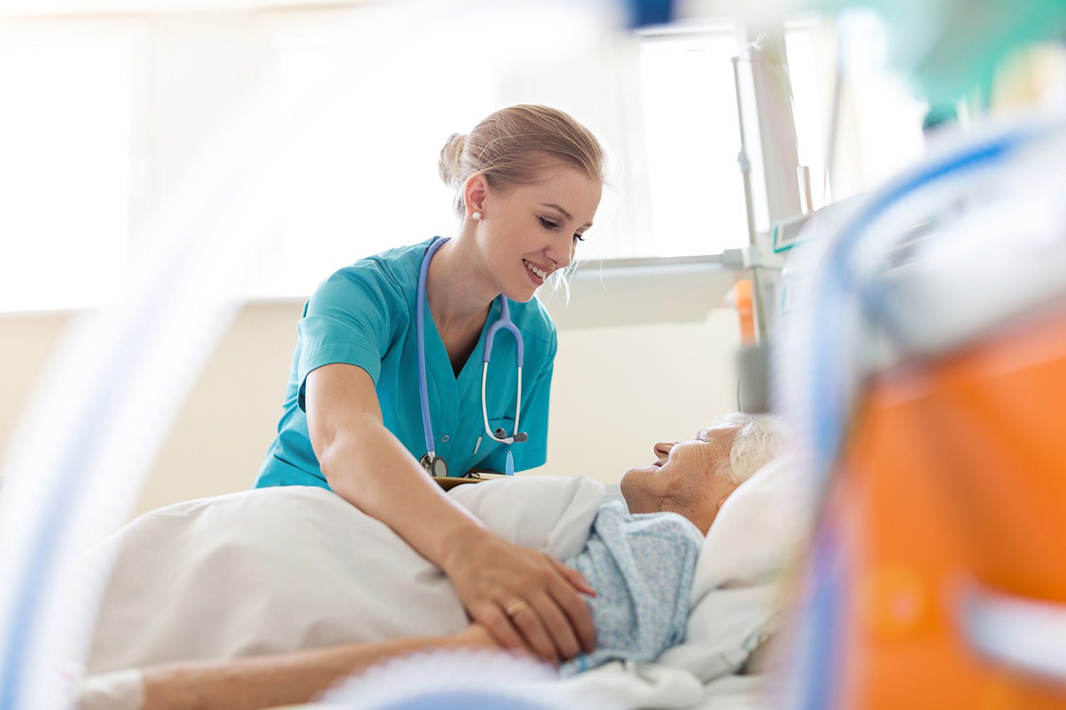 Hospice Nurse With Patient