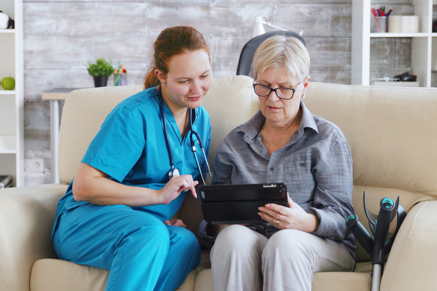 Nurse And Patient On Tablet